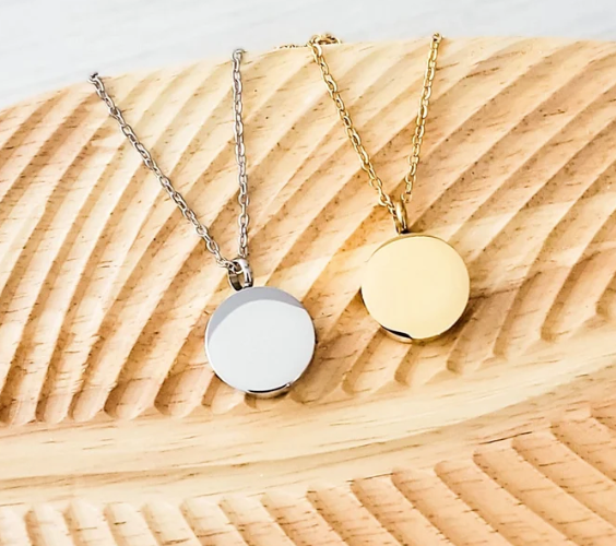"Circle urn memorial necklace for cremation ashes in silver and gold stainless steel"