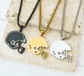 "Football helmet pendant necklace in silver, gold, and black stainless steel with box chain"
