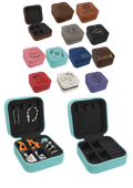 A set of small square jewelry boxes shown in multiple colors, with several closed and two open to display interior compartments and jewelry storage. The boxes feature a faux leather exterior and black lined interiors, with some printed monogram or script designs on the lids.