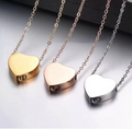 "Solid heart urn memorial necklace for cremation ashes in gold, rose gold, and silver stainless steel"