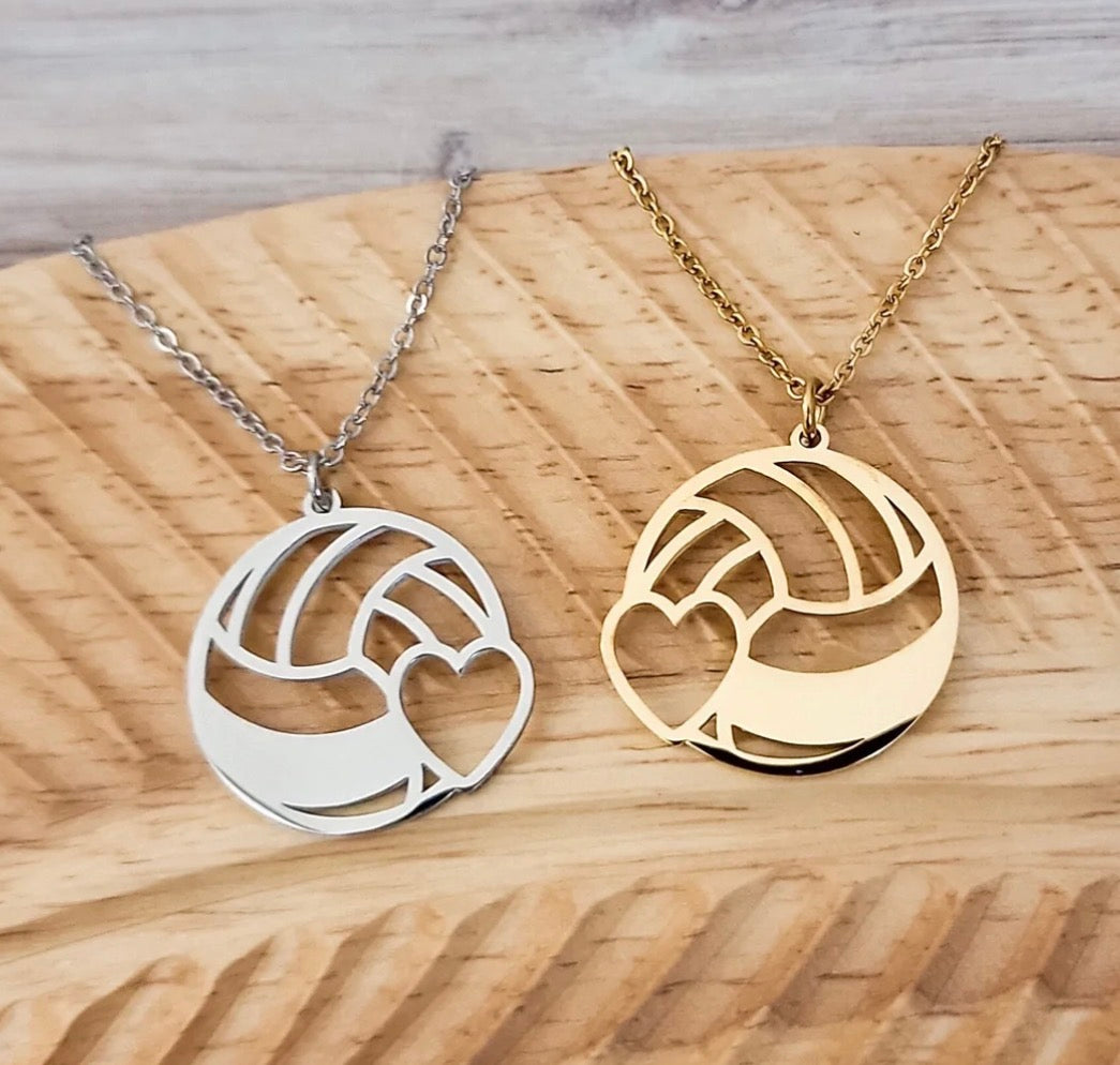 "Volleyball heart cut-out pendant necklace in gold-tone and silver-tone stainless steel"
