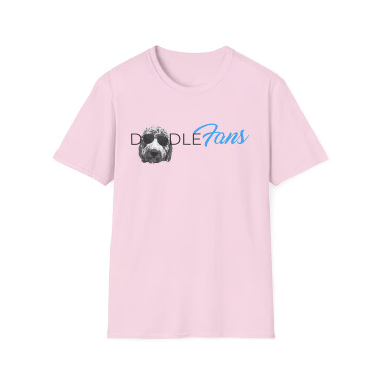 A light pink short-sleeve crewneck t-shirt featuring a graphic on the chest with the text 'Doodle Fans' in black and blue, alongside a black and white doodle dog illustration.